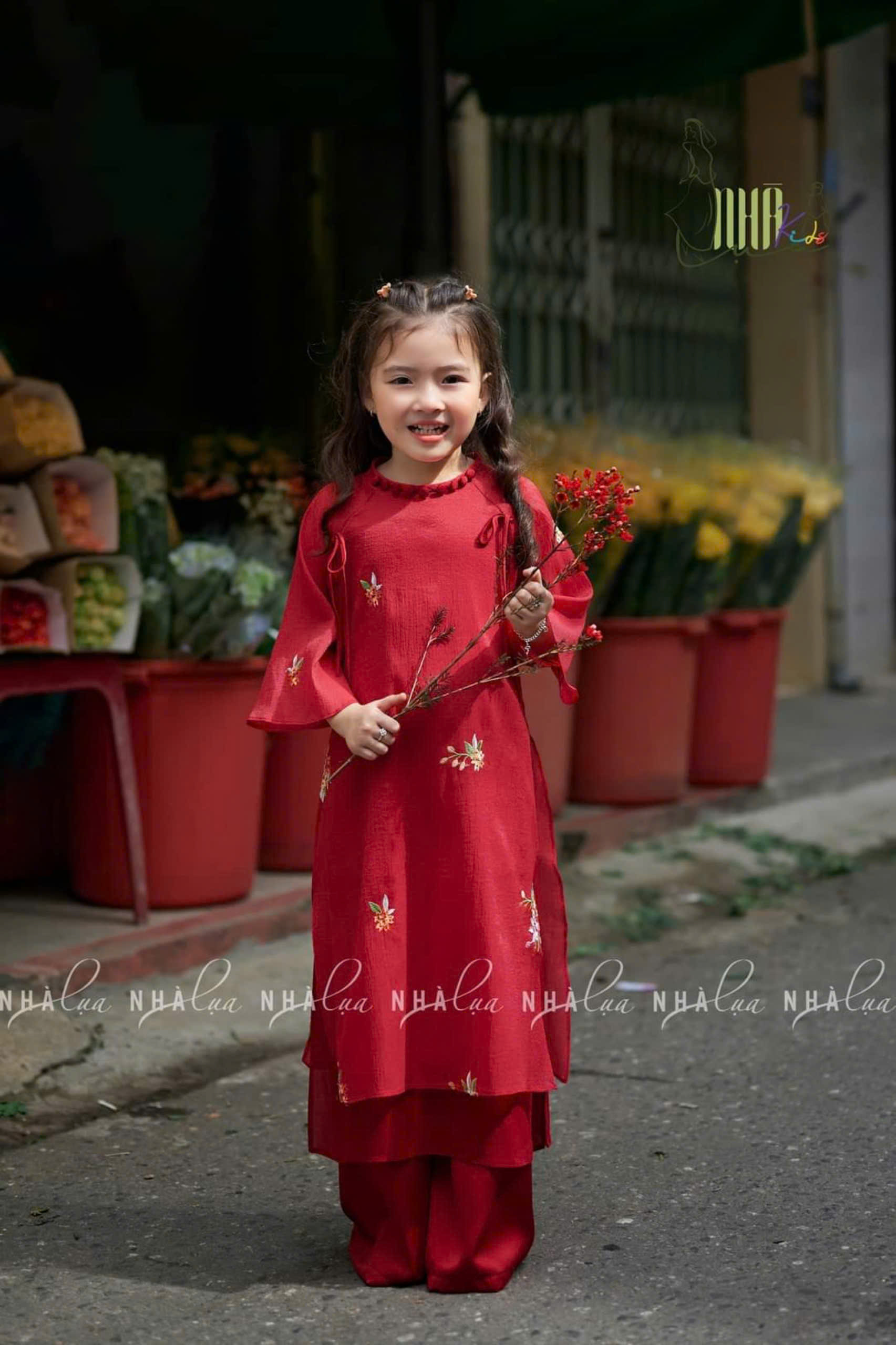 áo dài bé gái 2 nơ đỏ cổ tết
